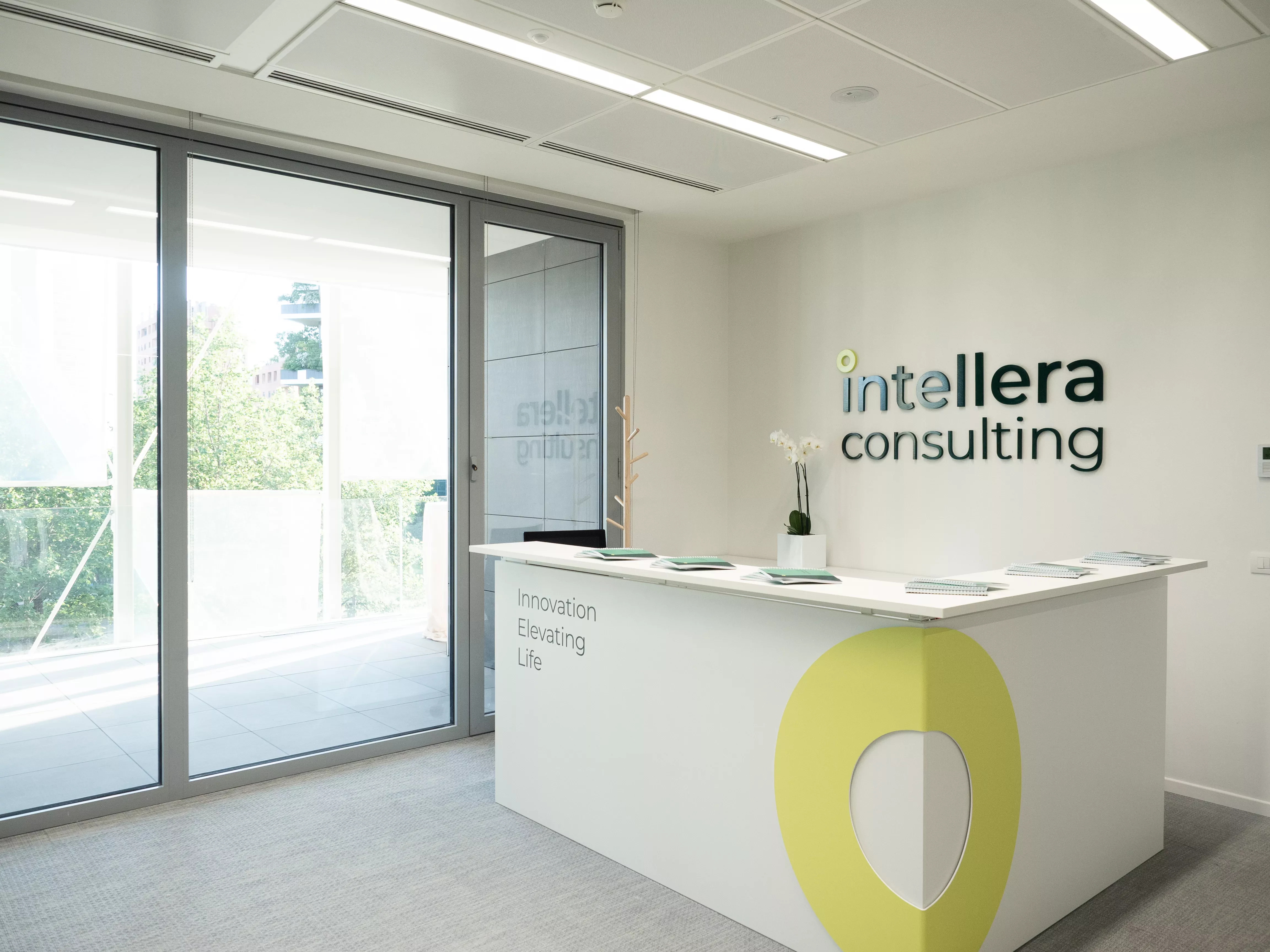 Modern office reception with Intellera Consulting logo, reflecting the firm’s focus on public sector and healthcare consulting.