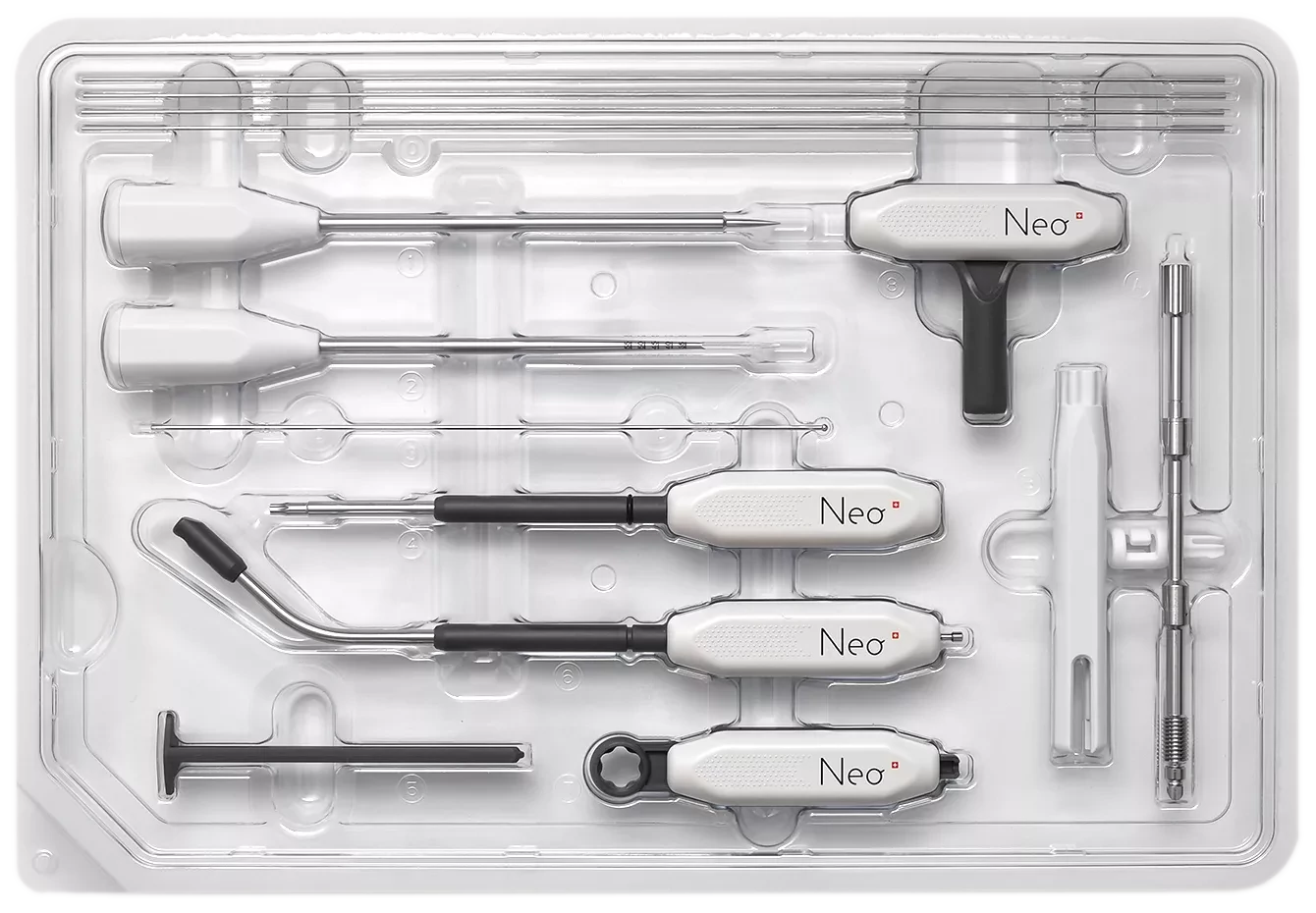 A sterile, plastic-molded tray containing a medical instrument kit, likely for surgery. The kit includes several white and black handled metallic instruments, some labeled with the "Neo" brand name.